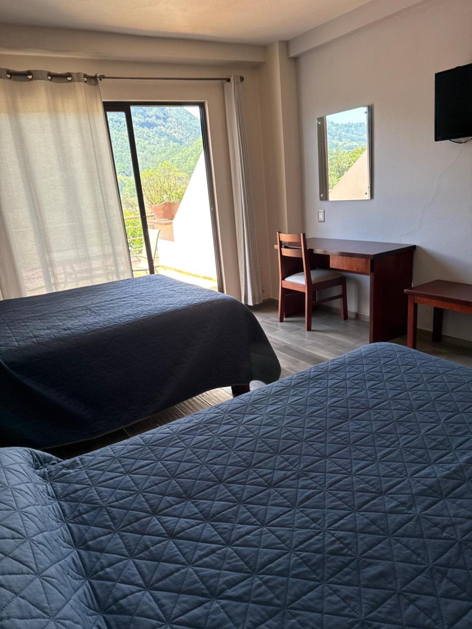 Hotel Suites Don Miguel Tlatlauquitepec Exteriör bild
